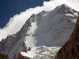 06 Gasherbrum IV Summit Close Up From Upper Baltoro Glacier On Trek To Shagring Camp The west face and summit of Gasherbrum IV poked out from between two ridges as we trekked up the Upper Baltoro Glacier towards Shagring camp